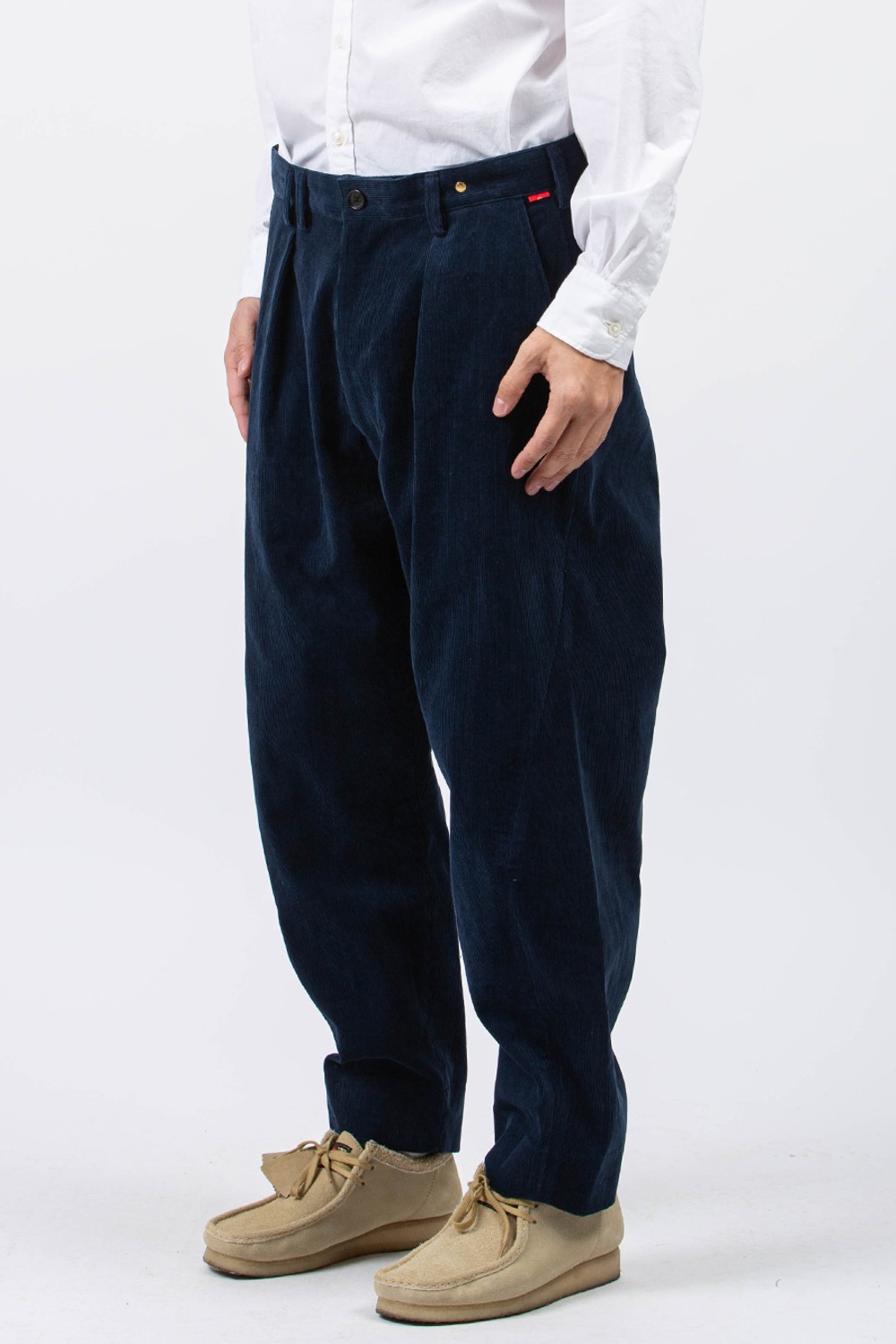 (23FW) DRAPING TAPERED TROUSERS NAVY